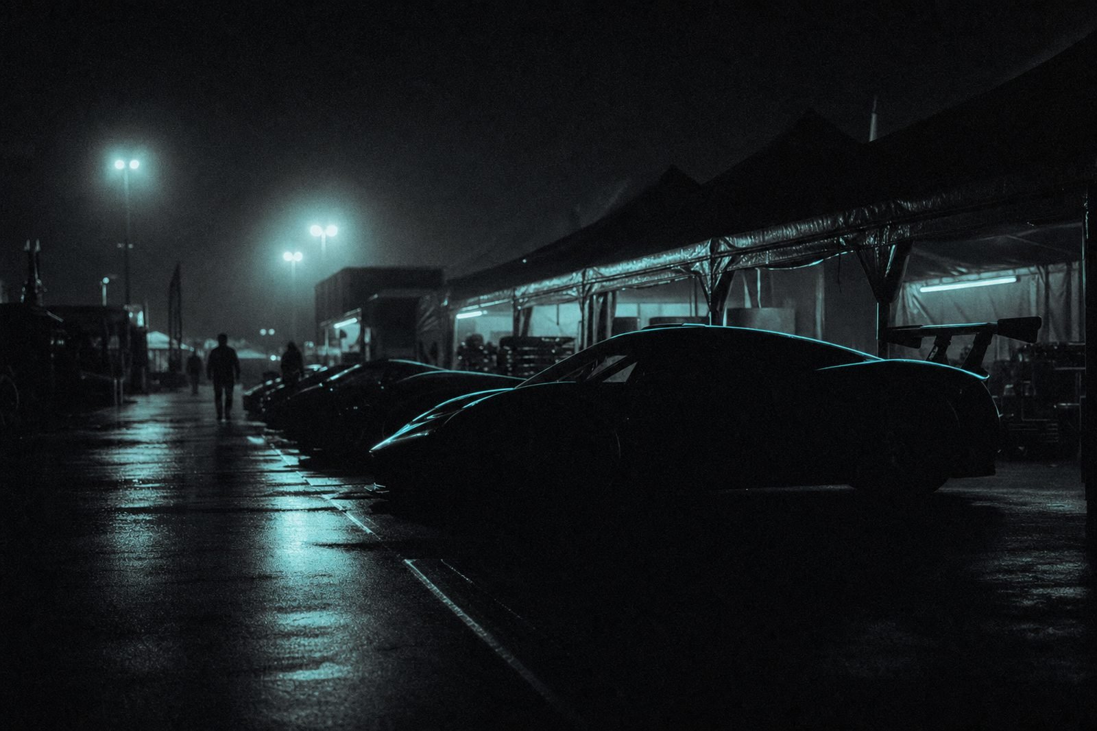 Cars staged in a night paddock